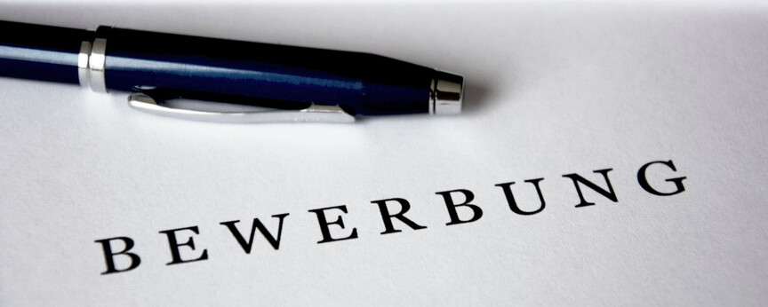 Abbildung Bewerbung mit Kugelschreiber. 
