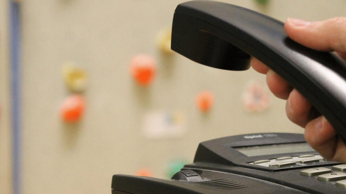 Das Bild zeigt einen Telefonhörer.